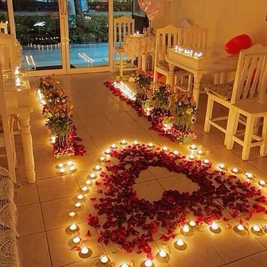 Romantic Roses and Candles Decorations: Flower Delivery Ajman