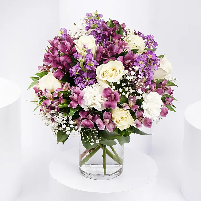 Purple and White Floral Bunch In Glass Vase: Easter Flowers