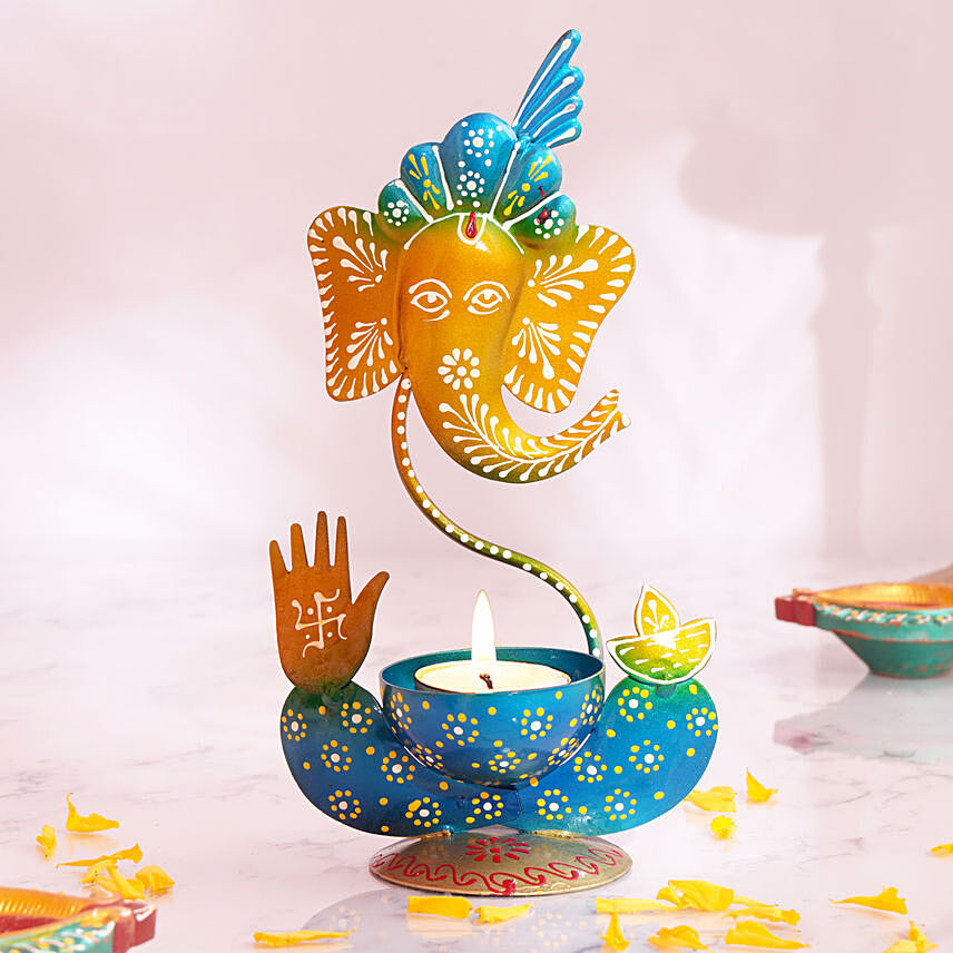 Colorful Metalic Ganesha with Tea Light Holder: هدايا التماثيل عبر الإنترنت