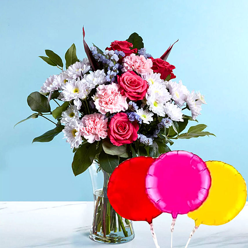 Pink and White Flower Vase With Balloons