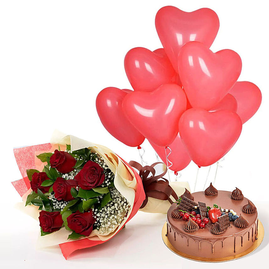 Red Heart Shape Balloons With Flowers and Fudge Cake