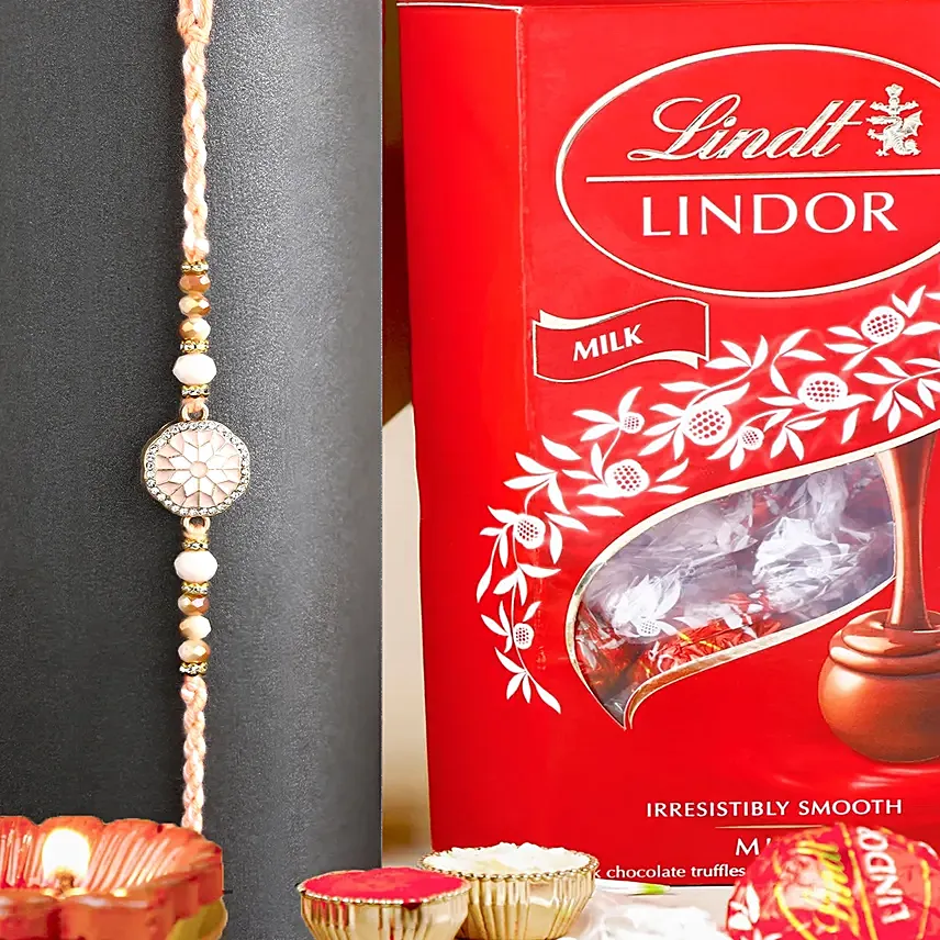 Rosy American Diamond Rakhi N Lindt