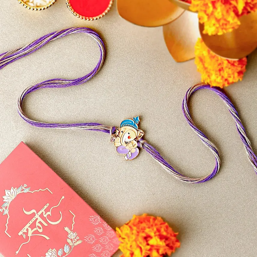 Bal Ganesha Cheerful Charm Rakhi