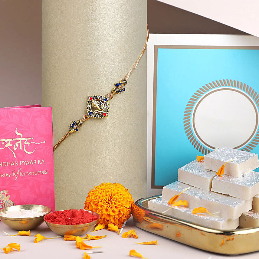 Online Celestial Ganesha Serenade Rakhi with Kaju Katli Combo Gift ...