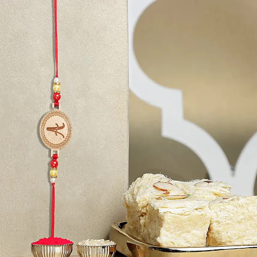 Sneh Personalised Small Oval Shaped Rakhi N Soan Papdi