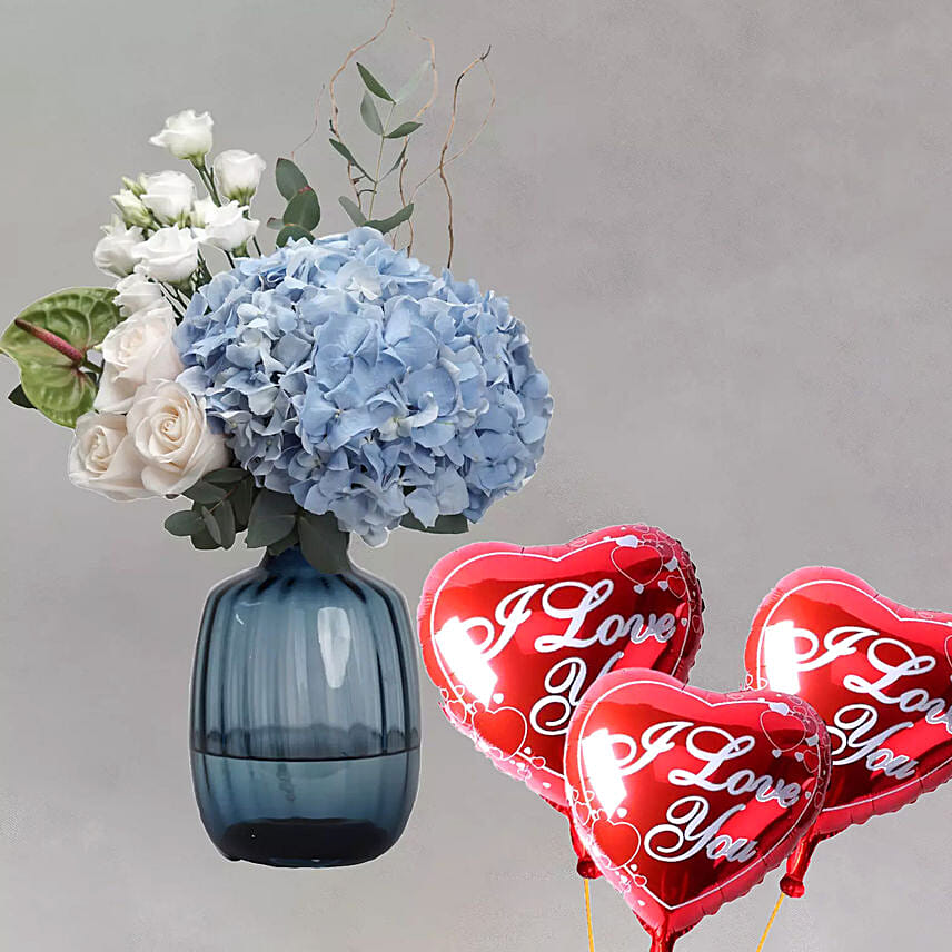 Captivating Mixed Flowers In Blue Glass Vase With I Love You Balloons