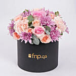 Elegant Flower Arrangement in a Black Box