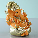 Gold Plated Orange Ganesha Idol