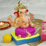 Ganesha idol with modak