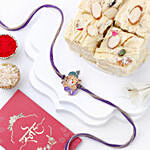 Bal Ganesha Cheerful Charm Rakhi N Soan Papdi