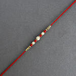 Luminescent Luster Pearl Rakhi N 3 Rocher