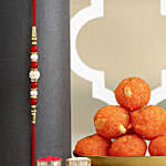 Luminescent Luster Pearl Rakhi N Motichoor Laddoo