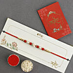 Luminescent Luster Pearl Rakhi With Almonds N Cashew