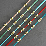 Understated Elegance Beads Rakhi Set of 5 With Mixed Nuts