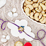 Bal Ganesha Cheerful Charm Rakhi N Roasted Cashews Gift Set