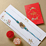 Melodic Krishna Flute Rakhi With Almonds and Cashew