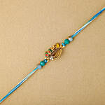 Melodic Krishna Flute Rakhi With Almonds and Cashew