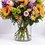 Vibrant Bunch of Flowers In Glass Vase