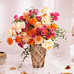 Marigold And Roses In Premium Vase