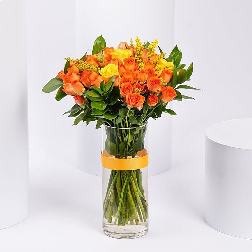 Orange And Yellow Rose Arrangement In A Vase