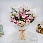 Pink Roses And Lily Bouquet In White Wrapper